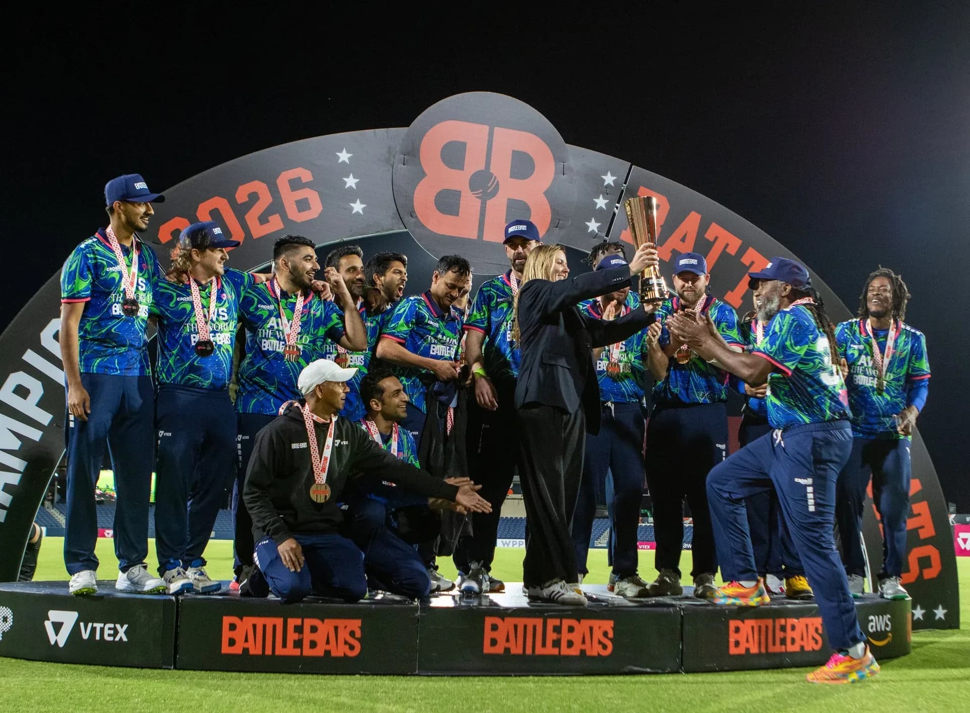 Team celebration — trophy lift